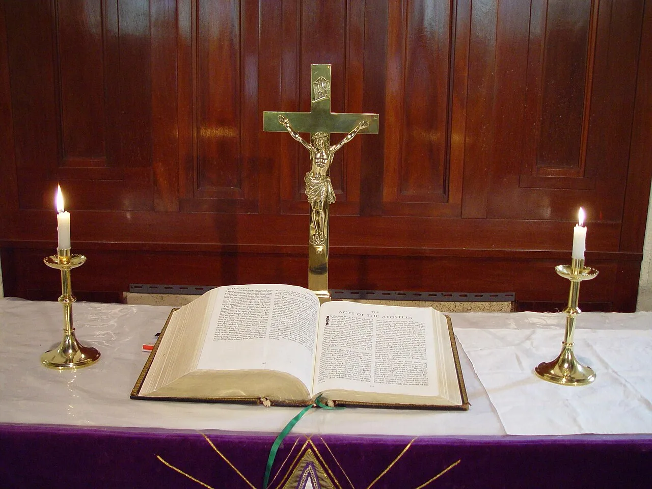 A Bible is placed centrally on a Lutheran altar, highlighting its importance