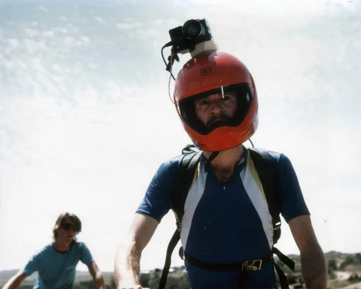 Biker wearing one of the first 'helmet cams' c. 1987