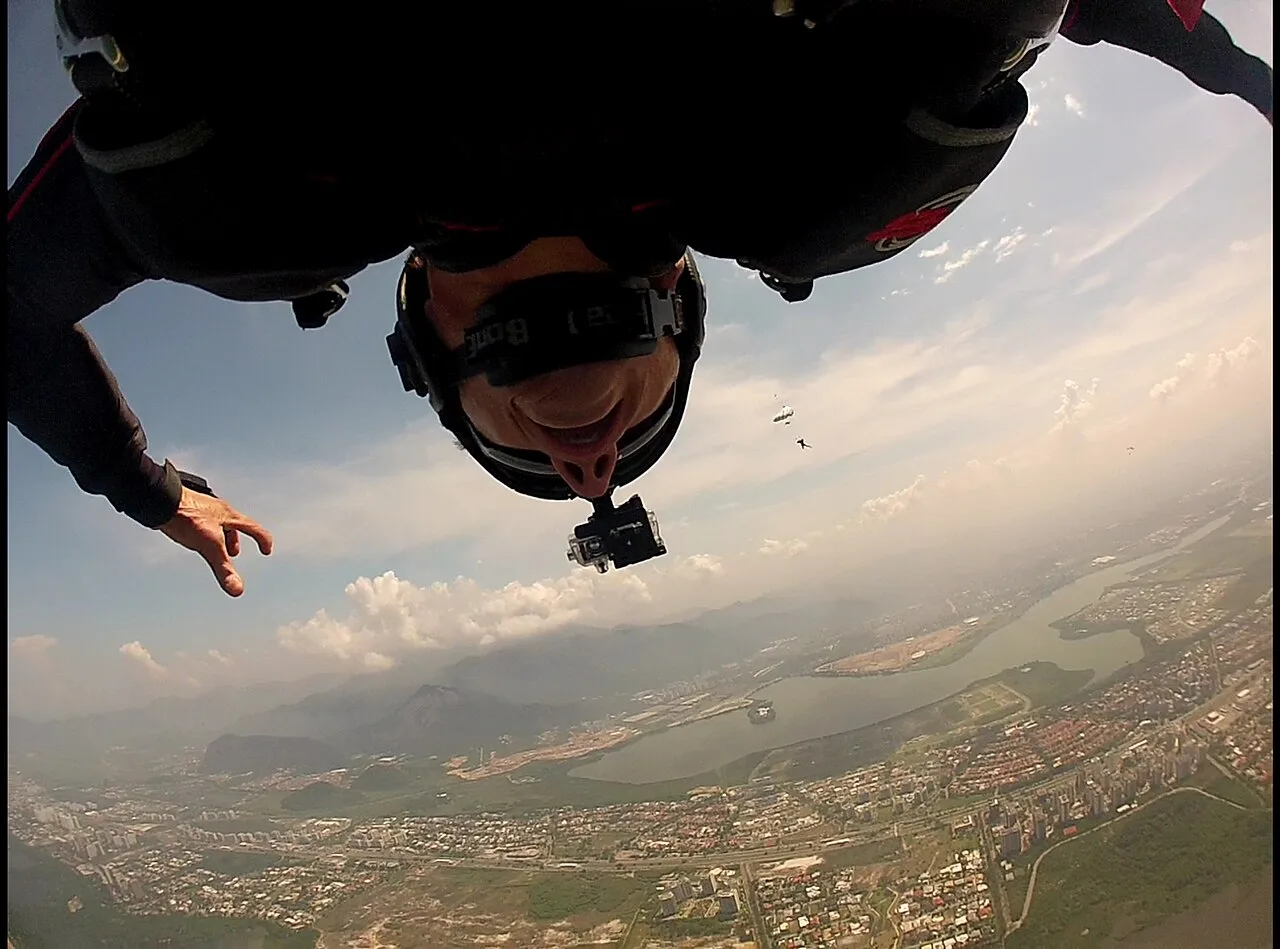 Skydiver with helmet camera