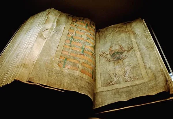 The Codex Gigas opened to the page with the distinctive portrait of the Devil from which the text received its byname, t