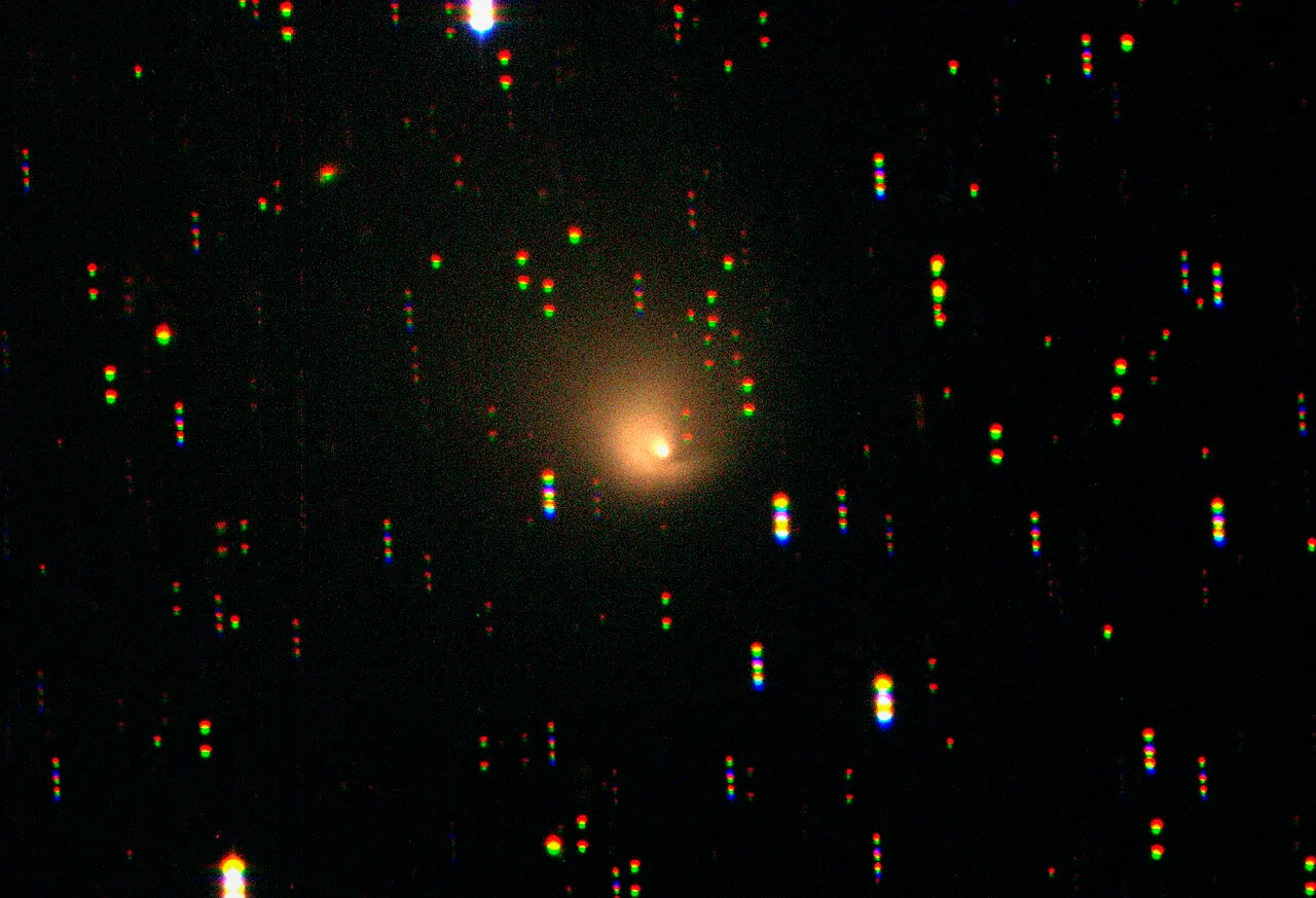Comet Hale–Bopp in 2001, at a distance of nearly 2.0 billion km (1.2 billion mi) from the Sun.[73]