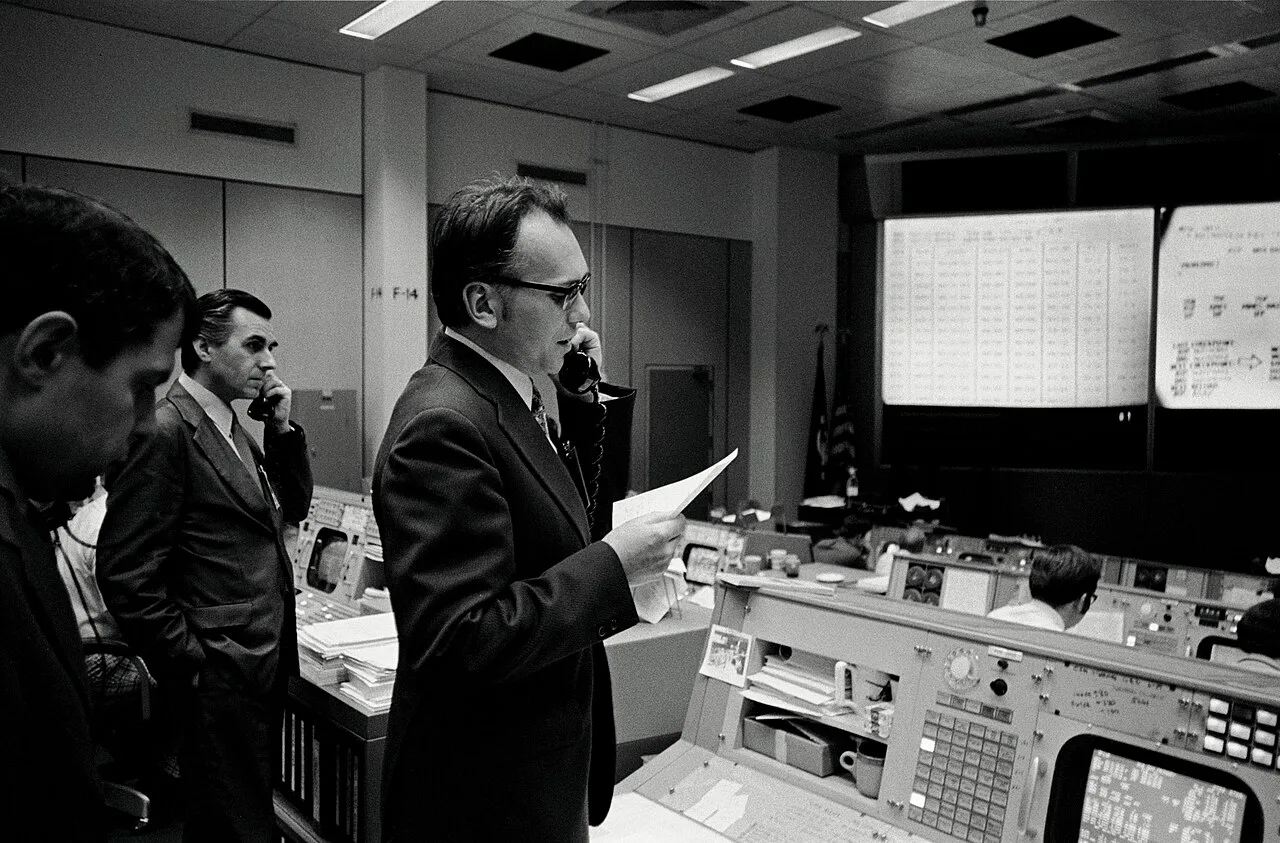 Photograph of Luboš Kohoutek at the mission control center at the Johnson Space Center