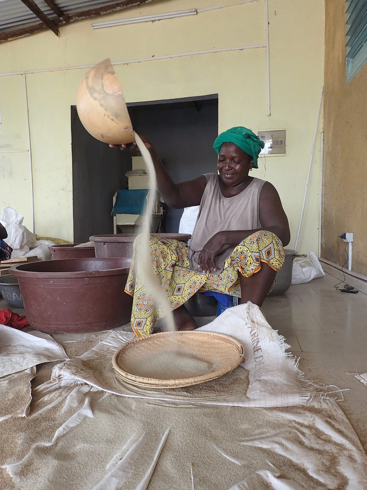 Winnowing fonio in Kédougou, Senegal