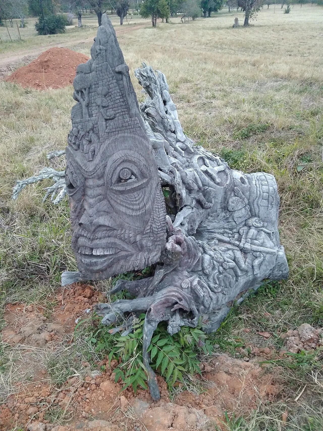 Modern wood carving at the entrance of the Great Zimbabwe