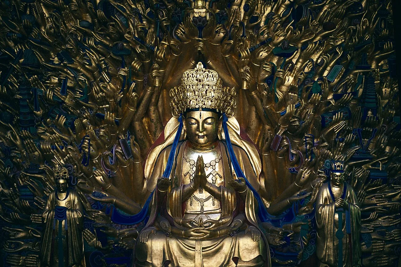 Tang dynasty (618-907) rock statue of the Thousand-Armed Guanyin (Qianshou Guanyin) at Baodingshan at the Dazu Rock Carv