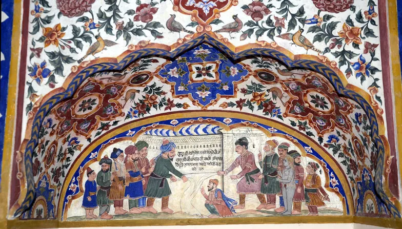 Hindus and Muslims disputing over the final rites of Guru Nanak. 19th century fresco from Gurdwara Baba Atal, Amritsar.