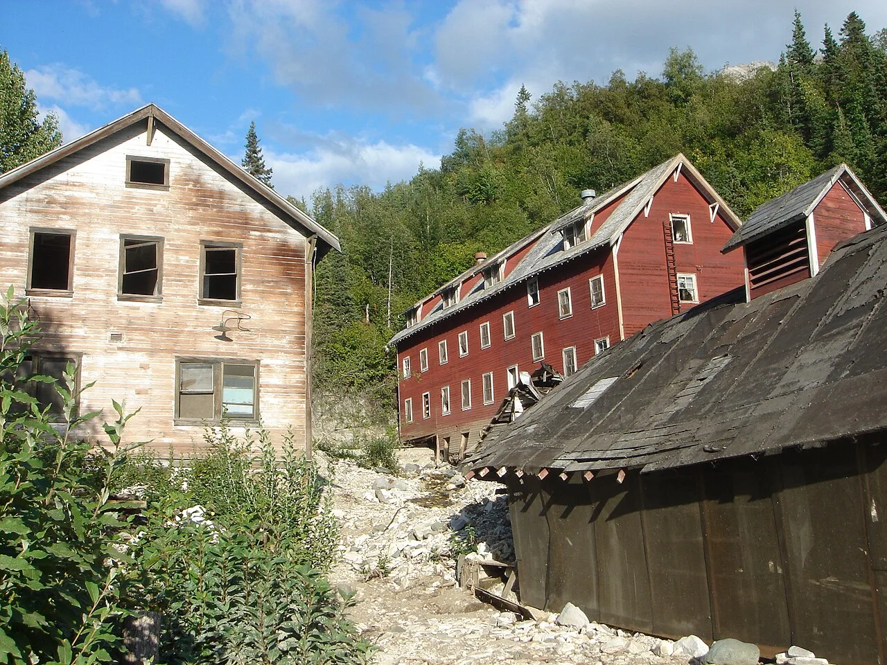 The Kennecott hospital (left) stood out as the town's only white-washed building. The vast majority of other town struct