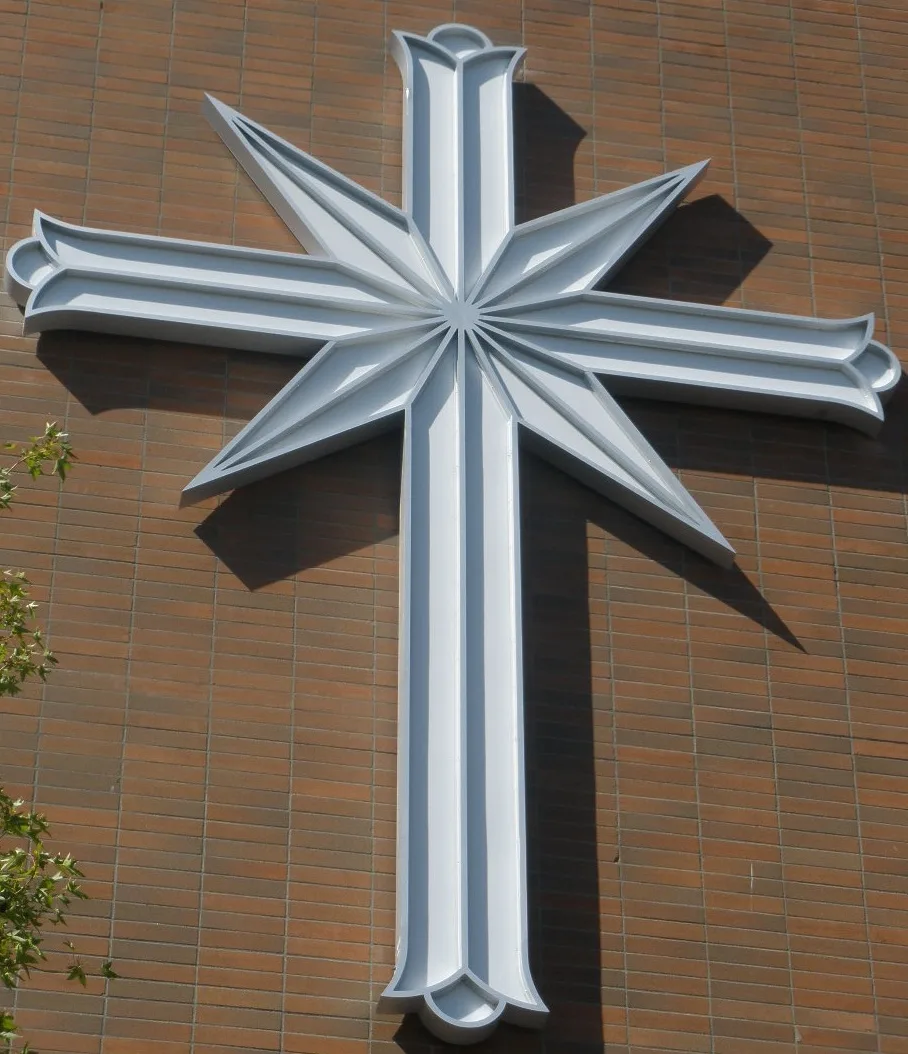 The Scientology cross came into use in 1969. Given Hubbard's private affinity for Crowley and antipathy to Christianity;