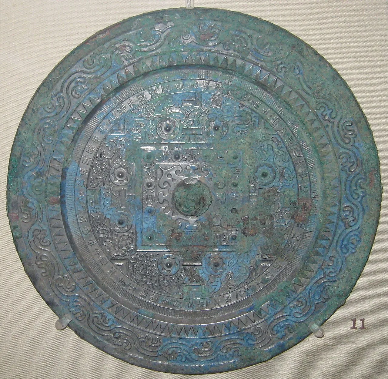 Han dynasty bronze mirror with TLV pattern
