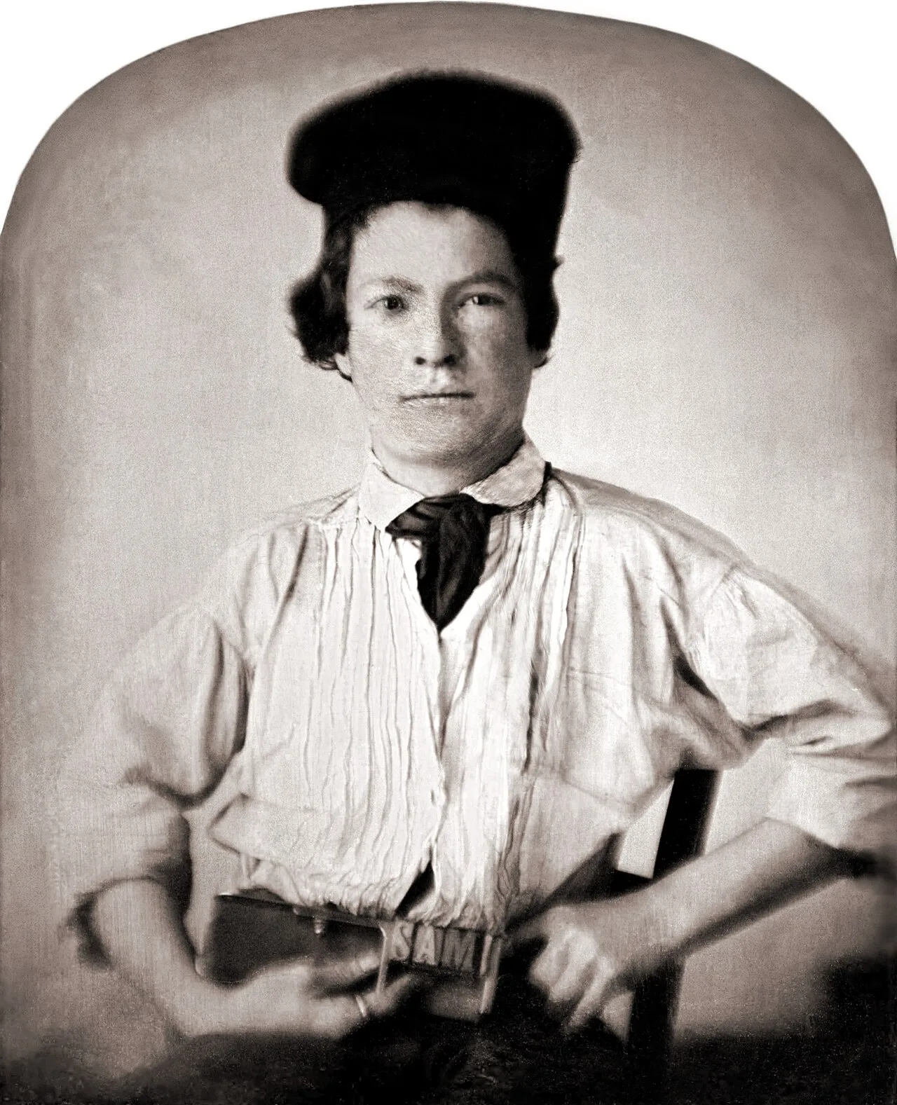Samuel Clemens, age 15 holding metal type in a composing stick that spells out his first name. As a daguerreotype, whose