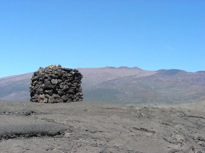 A stone structure or Ahu facing Mauna Kea, on Saddle Road between Mauna Kea and Mauna Loa