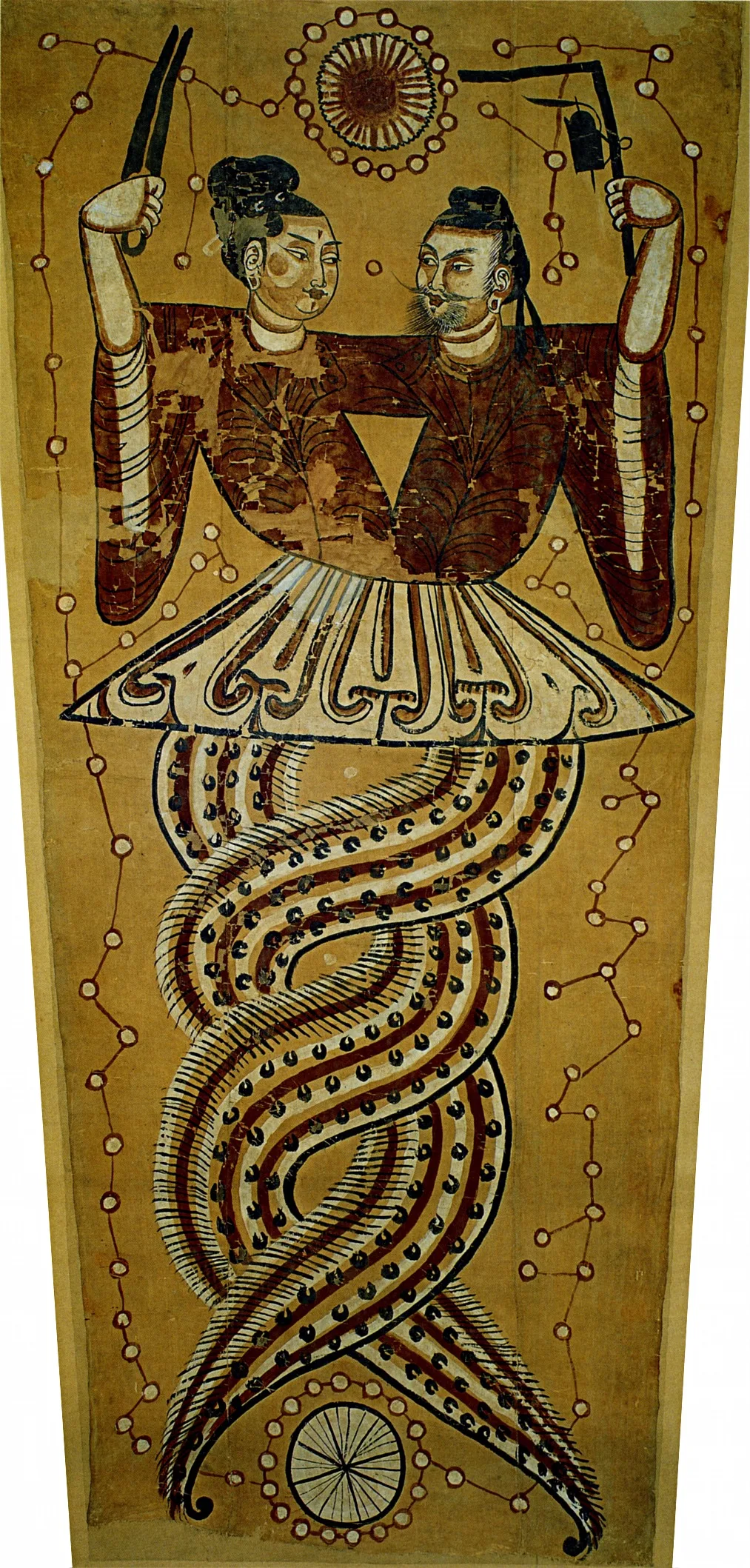 An ancient painting of Nüwa and Fuxi unearthed at the Astana Graves.