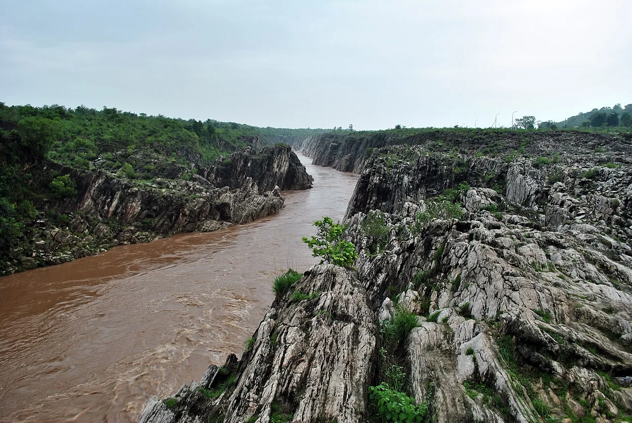 Narmada River flowing through a gorge of Marble Rocks in Bhedaghat