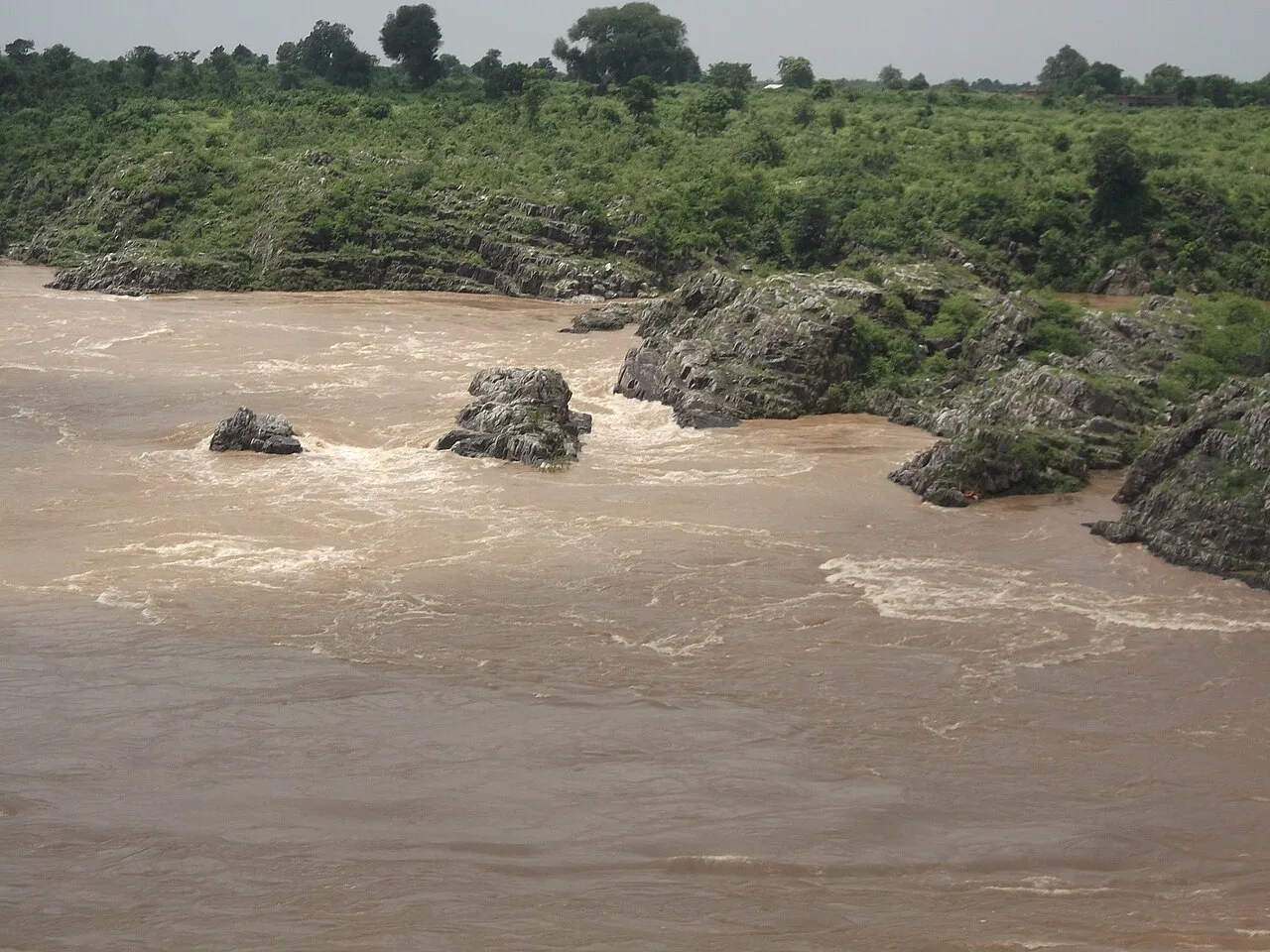 Narmada River at full flow during monsoon in Bhedaghat
