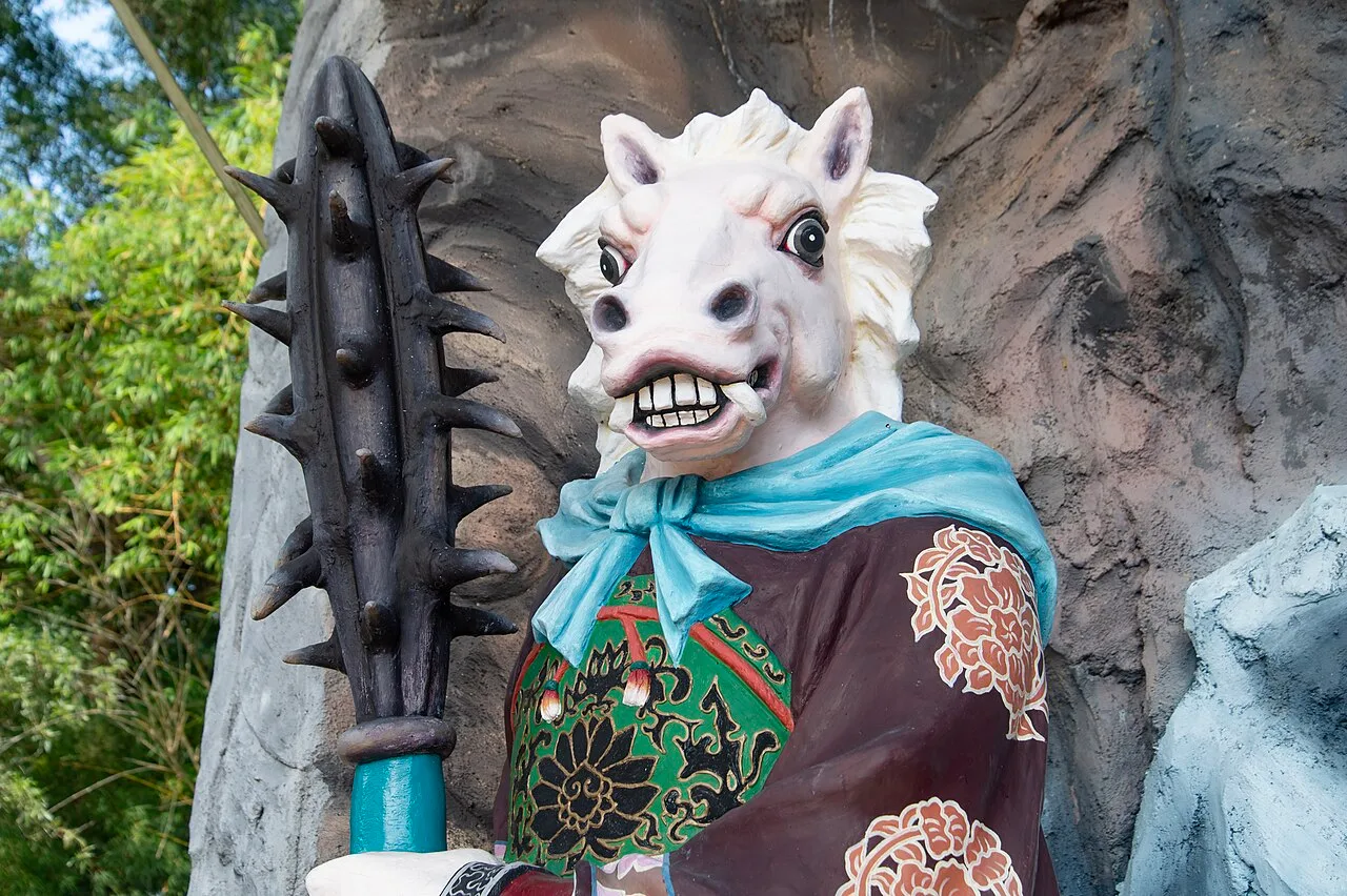 Close-up of the statue of Horse-Face at Haw Par Villa, Singapore.