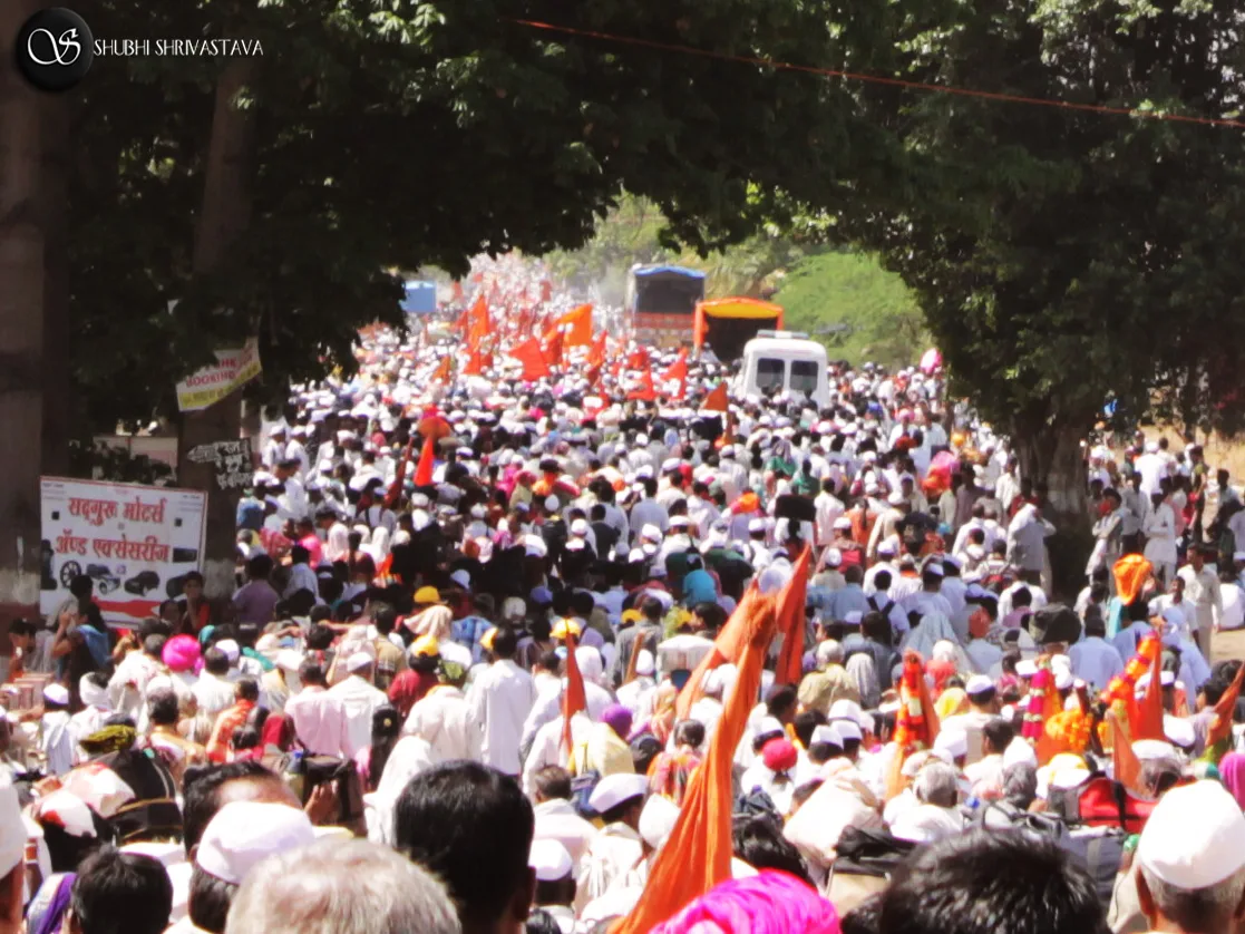 A procession Palkhi festival Hindu culture religion rites rituals sights