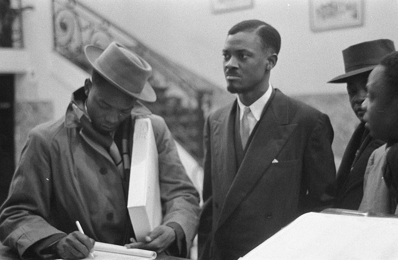 Lumumba pictured in Brussels at the Round Table Conference with other members of the MNC-L delegation, 26 January 1960