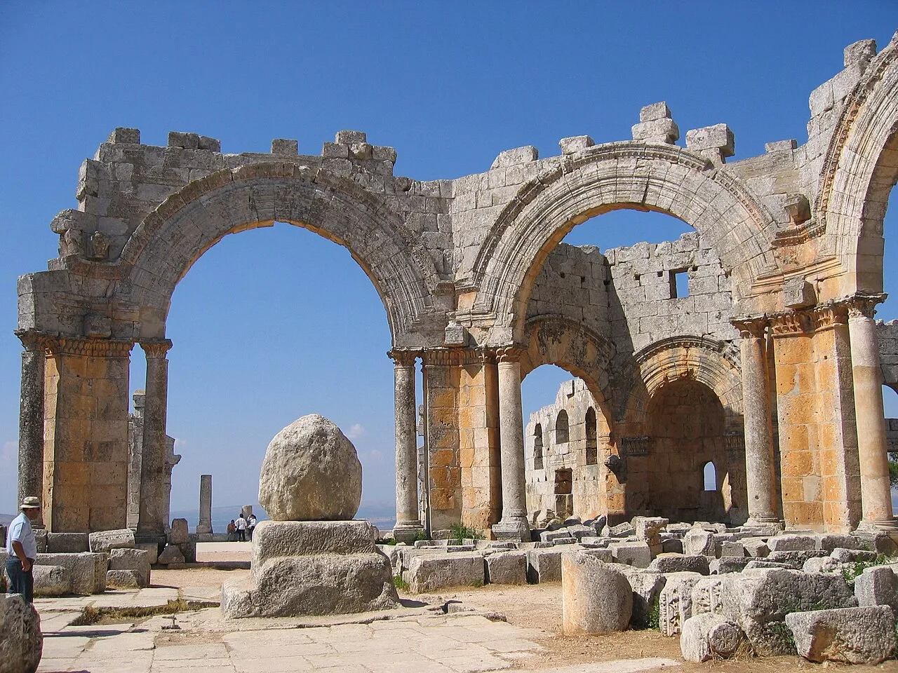 Ruins of the Church of Saint Simeon Stylites with remains of his column (centre, now topped with a boulder)