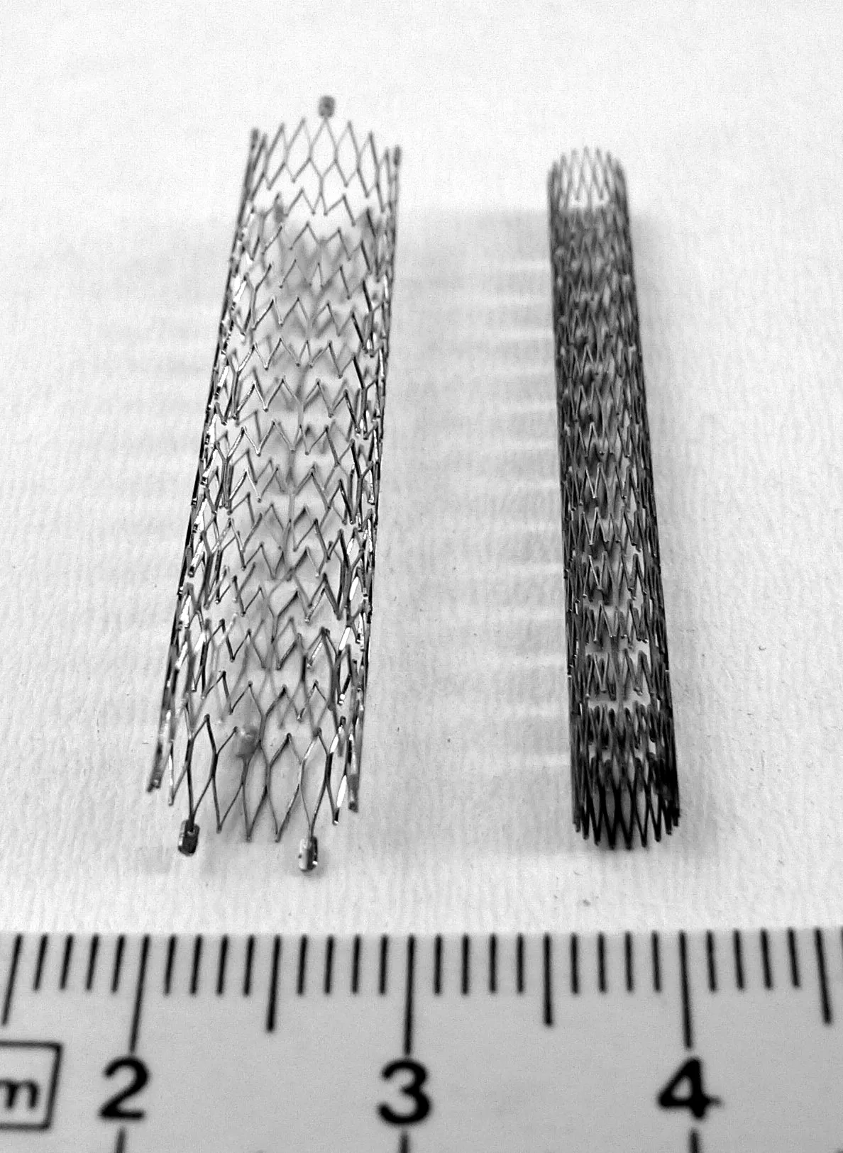 Compressed and expanded peripheral artery stents