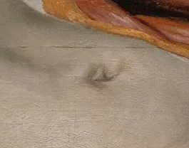 The corpse's navel is formed from the letter R