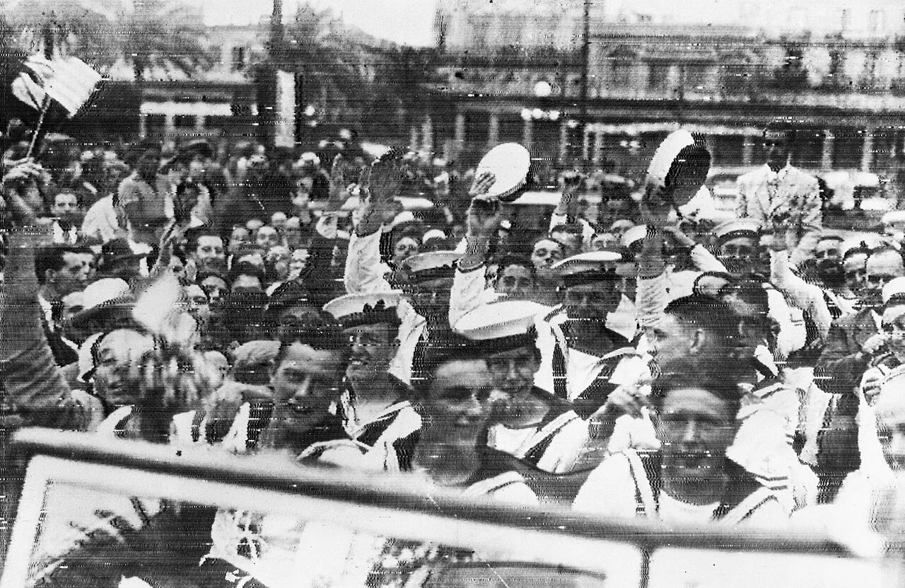 Royal Navy sailors from HMS Ajax being welcomed at Plaza Independencia in Montevideo following the Battle of the River P